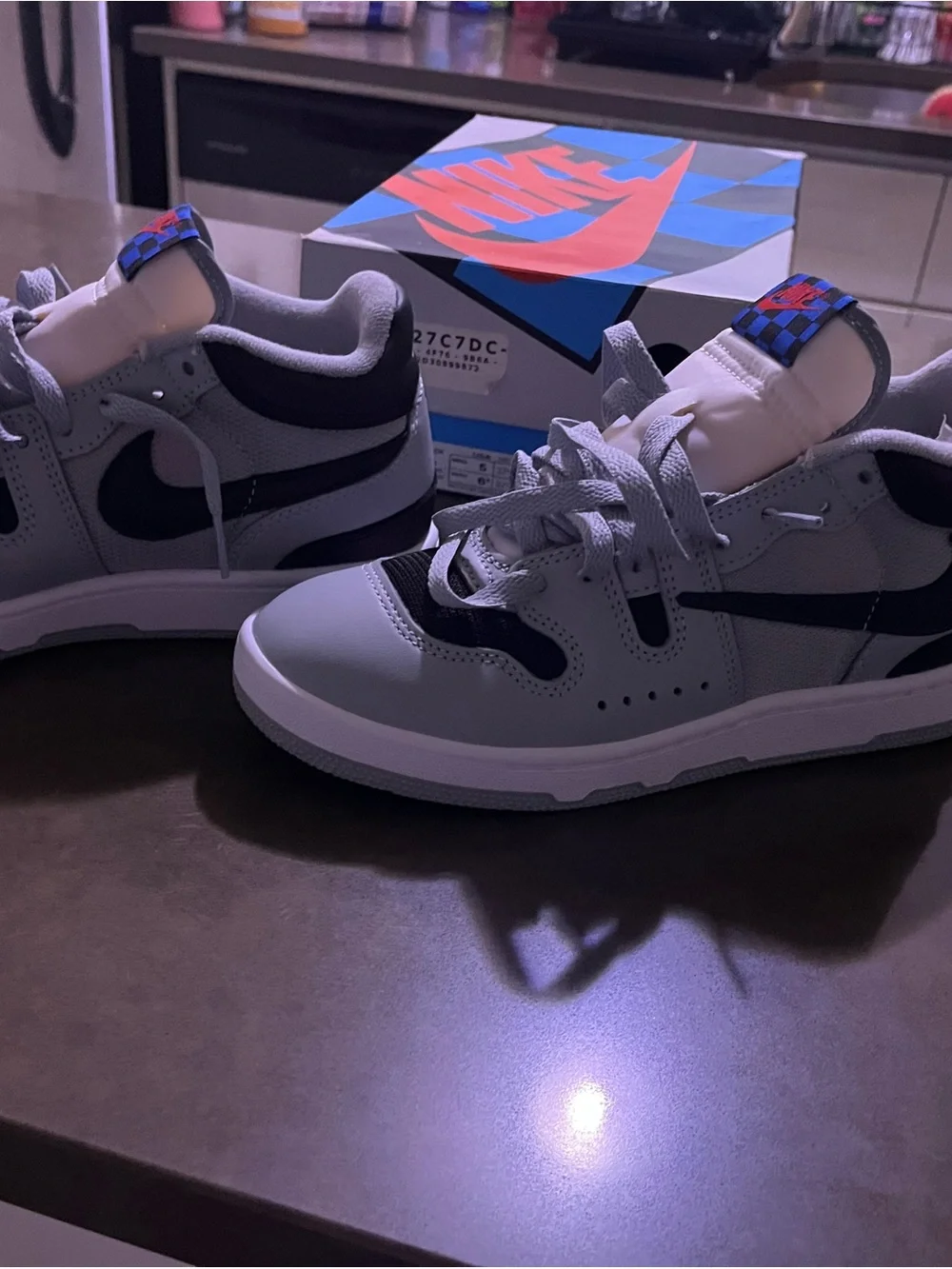 Nike Kids Gray and Black Low-Top Travis Scott 5 kids or 6.5 women. New in box.